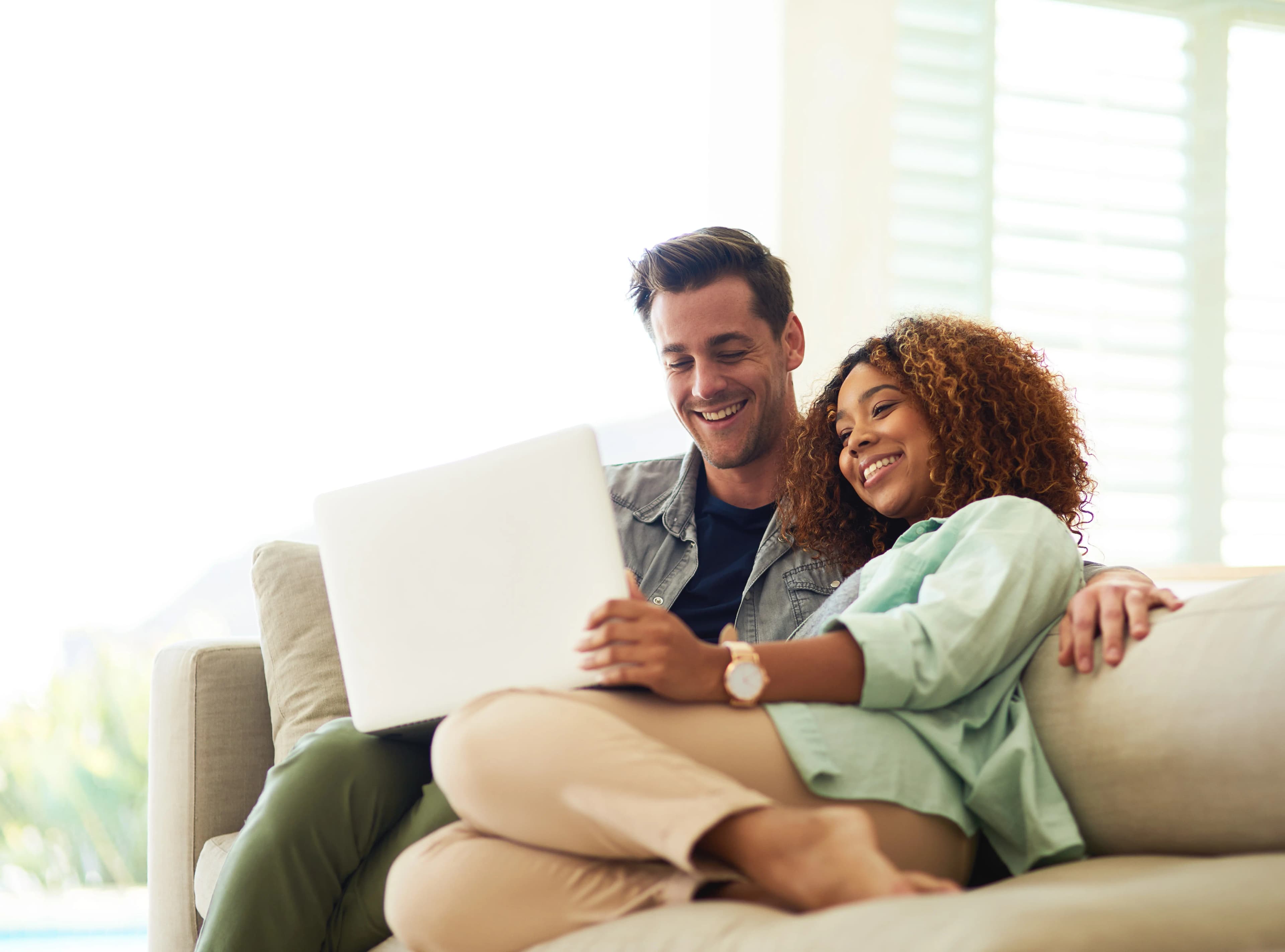 Couple reviewing their mortgage options together at home
