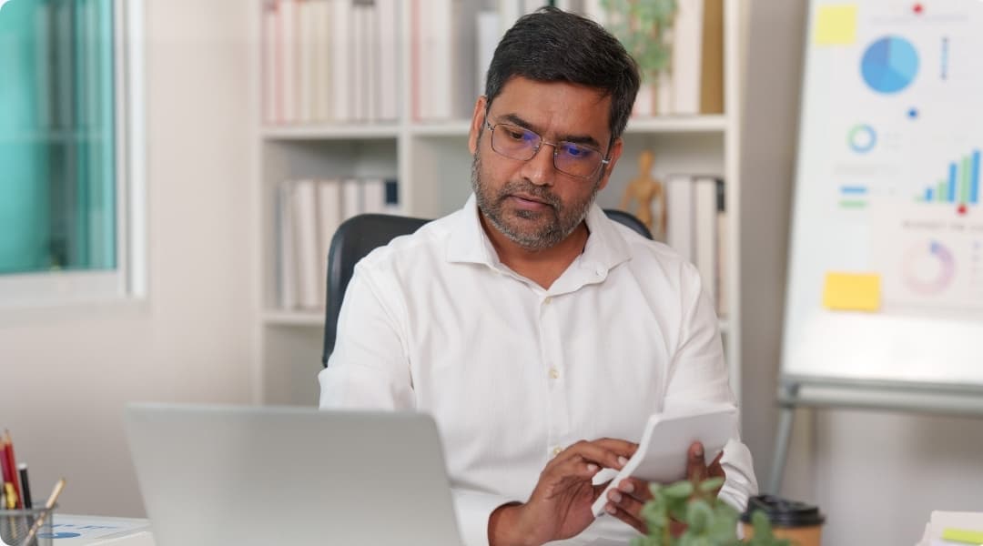 Client reviewing private mortgage financing at a laptop