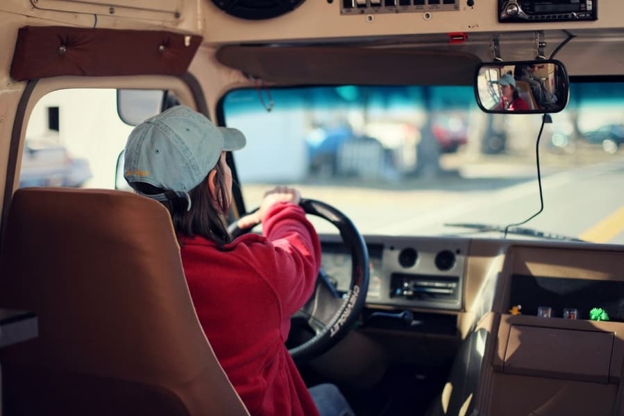 Self-employed truck driver behind the wheel