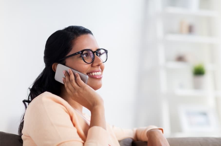 Mortgage broker speaking with a client by phone